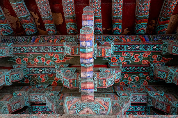 Gyeongju, South Korea, November 13, 2025. Intricate Dancheong patterns adorning a traditional Korean Buddhist temple ceiling, displaying cultural heritage and colorful artistry