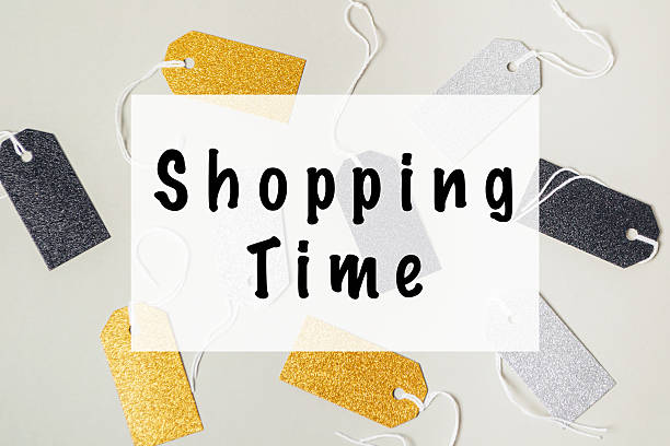 istock Colorful shopping tags in various shapes and sizes, featuring glittery textures, arranged artistically on a light background, conveying a festive shopping atmosphere 2249912215