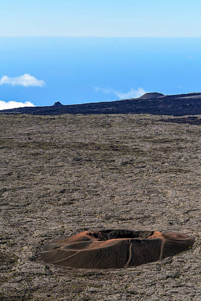 Peak of the Furnace is a shield volcano on the eastern side of Réunion island, a French overseas department and region, in the Indian Ocean.