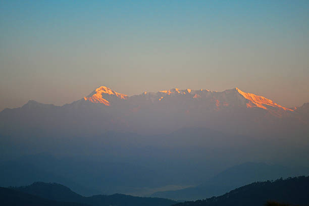 istock The Himalayan peaks glow with the soft light of dawn. 2249913966