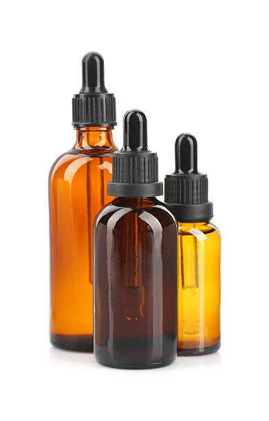 istock Glass bottles of tincture isolated on white 2249915729