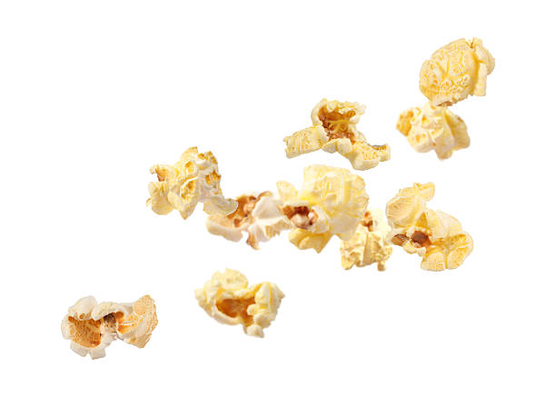 istock Tasty fresh popcorn flying on white background 2249916900