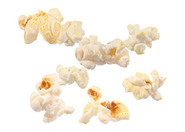 istock Tasty fresh popcorn flying on white background 2249916944