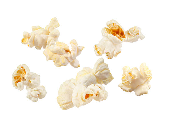 istock Tasty fresh popcorn flying on white background 2249917004