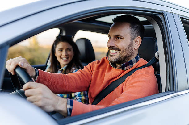istock Couple enjoying a scenic drive through nature 2249917092