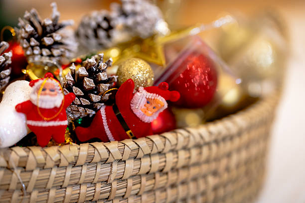 istock Putting on a christmas tree ornament close up 2249917742