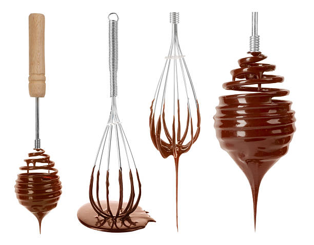 Whisks with chocolate cream isolated on white, set