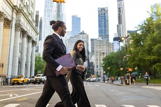 istock Business Professionals Crossing Street 2249921301