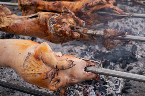 Whole roasted suckling pig is on sale in supermarket in Thailand.