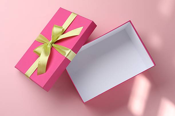 istock Open gift box with beautiful lid on pink background, top view 2249924685