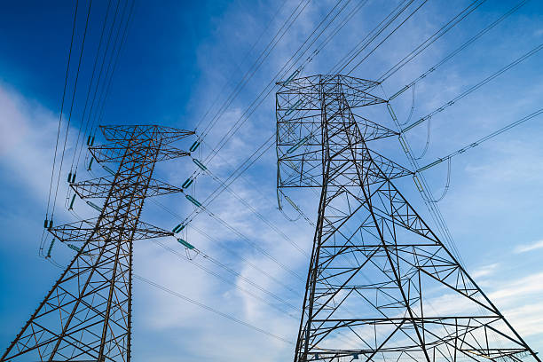 istock Electricity transmission pylon, high voltage power lines tower 2249925125