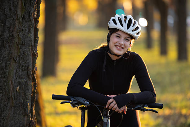 istock Smiling cyclist enjoys a sunny day in the park 2249929463