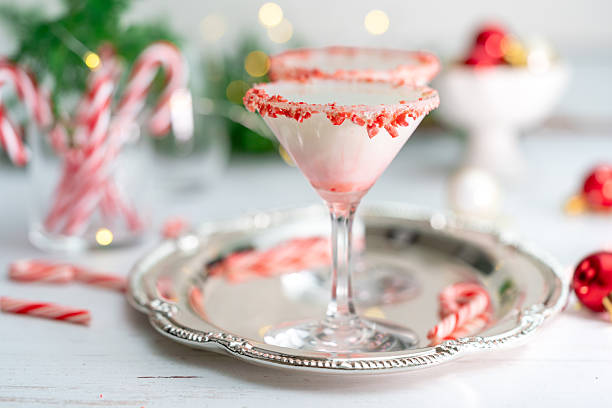 istock White chocolate martini cocktail with candy cane. 2249929709