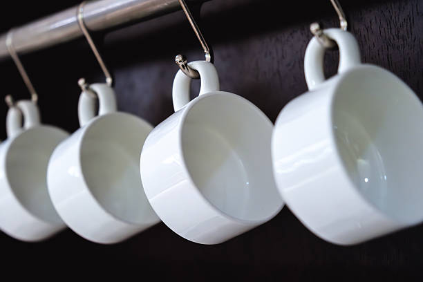 istock Rows of empty white cups for coffee or tea in seminar event or meeting room 2249930450