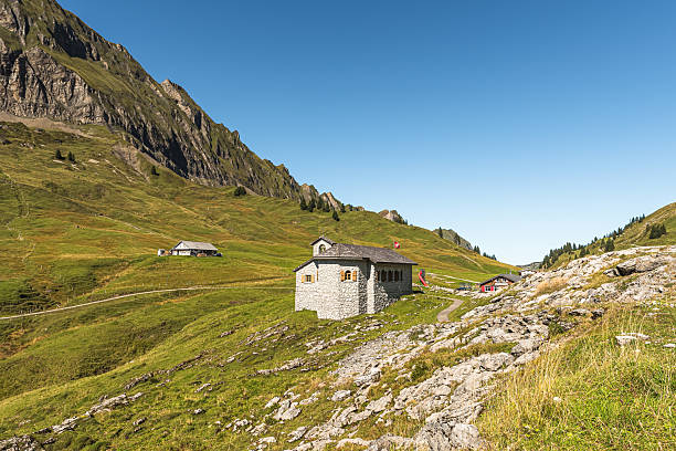 istock Stone chapel in mountain landscape at Pragelpass summit, Switzerland 2249934368