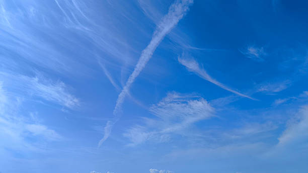 istock white aircraft trails at the blue sky 2249935340