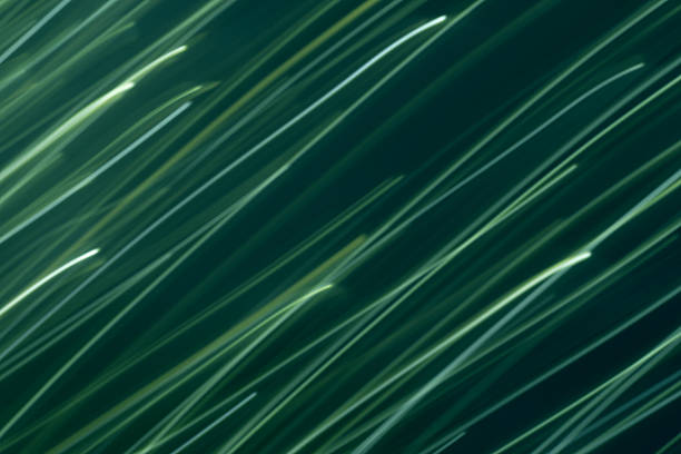 istock Abstract diagonal blue and green wavy line background 2249939119