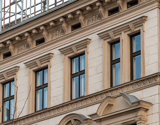 istock Classic historic facade architecture with decorative cornices and elegant window frames in the old city quarter 2249941179