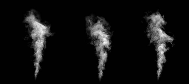 istock Three vertical smoke columns rising on a black background, showing realistic vapor movement and mist texture ideal for visual effects, overlays, cinematic scenes, digital composition. 2249942588