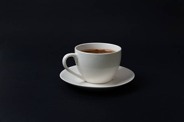 istock Side view coffee cup on dark backdrop, ideal for cafe branding, product presentation, menu layouts, and elegant food photography 2249946928