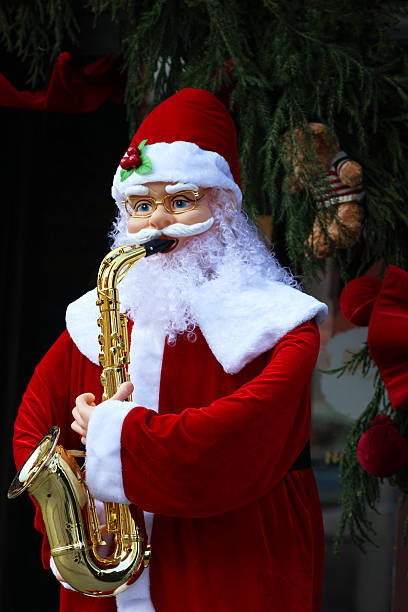 istock Santa Claus playing the saxophone 2249950896
