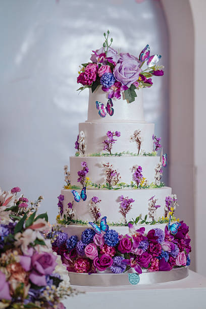 istock white cake decorated with flowers 2249957309