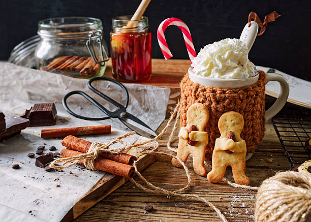 Festive Mug of Hot Chocolate with Candy Cane and Holiday Cookies