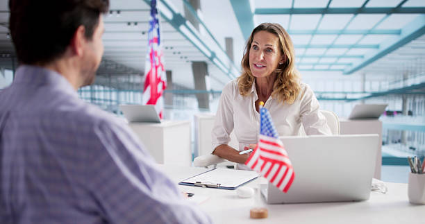 istock Immigration Lawyer Conducting US Visa Application Meeting 2249959213