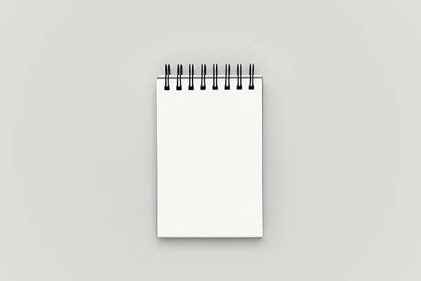 istock Blank notebook on background color of 2026 year 2249959606