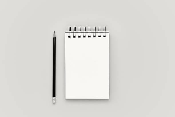istock Blank notebook and pencil on background color of 2026 year 2249959621