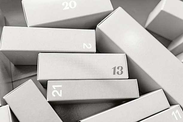 Advent calendar boxes in color of 2026 year. Celebrating the holiday season cloud white