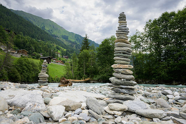 Crystal-clear mountain stream flowing over rocks and pebbles