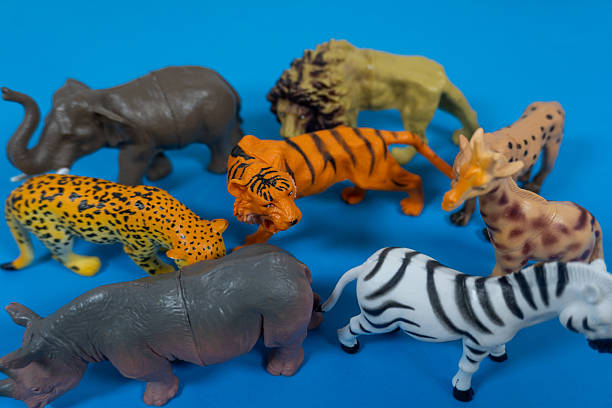 istock Collection of Toy Wild Animals on Blue Background 2249967977
