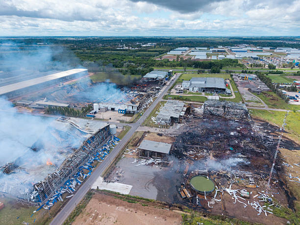 istock A large fire is burning in a city, with smoke billowing into the sky 2249974876
