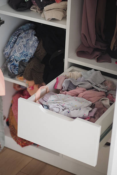 istock Drawer filled with assorted folded clothes in a closet 2249976212