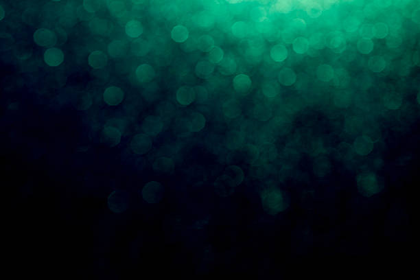 istock Background of abstract green glitter lights. 2249977023