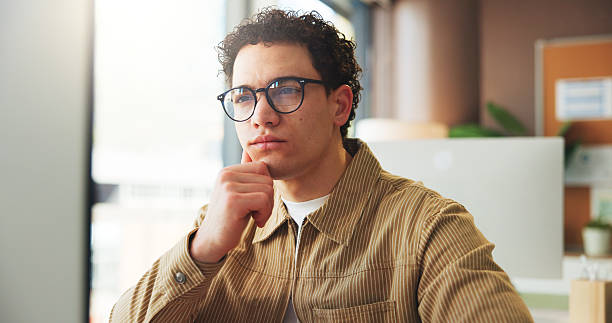 istock Computer, thinking or journalist in digital agency for planning, article ideas or change story perspective. Reflection, new writing angle or man with creative process for draft review, pc or reading 2249978652