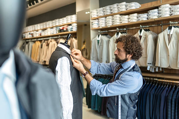 istock Man Working on Tailored Jacket in Fashion Studio 2249979933