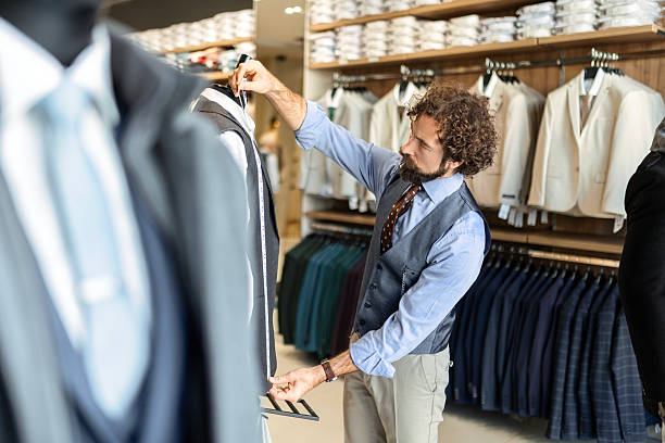 istock Designer Measuring Fabric for Elegant Men’s Jacket 2249980024