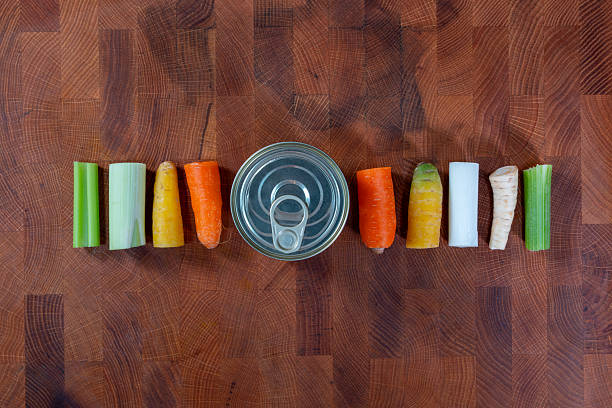 Fresh chopped vegetables and tin can