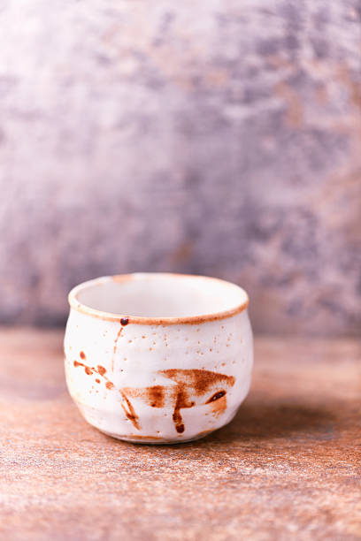 istock Traditional japanese ceramic on rustic wooden background. Soft focus. Copy space. 2249983764