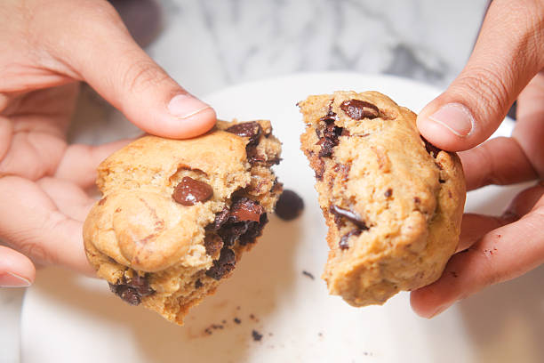 istock Delicious cookies being shared in a cozy kitchen 2249985093