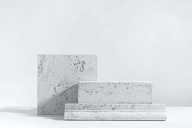 istock Abstract modern still life. Natural materials. Composition of travertine and concrete blocks. Color of the year 2026 2249987587