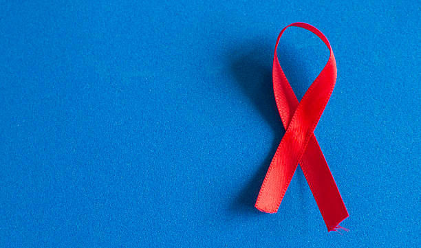istock Red ribbon symbol for World AIDS Day awareness and support 2249987963