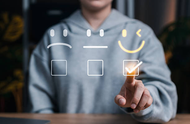 istock Customer satisfaction and feedback rating concept with user selecting happy face icon on digital interface, representing user experience, service quality, review system, and emotional engagement. 2249989332