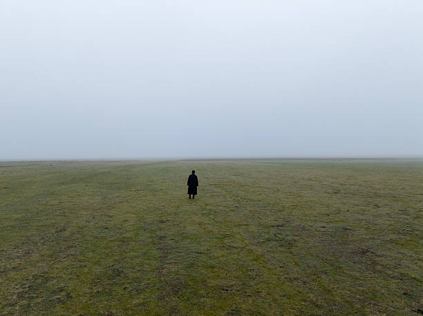 Man walking in fog