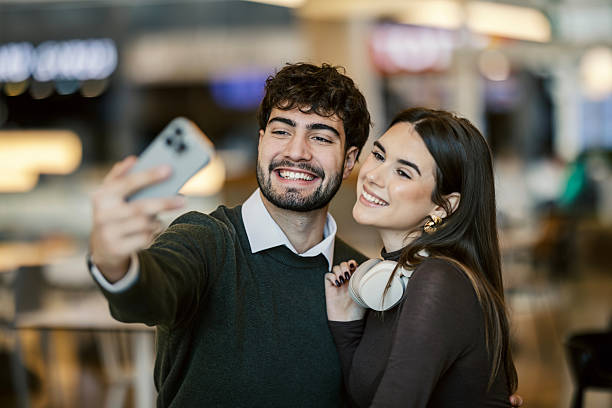 istock Happy young couple taking selfie together 2249994813