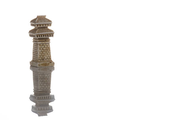 Close up photo of white chess piece isolated on a white background. Vintage asia style.