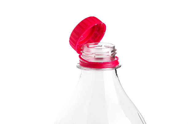 istock Close-up of a clear plastic bottle with a red cap against a white background 2250003623