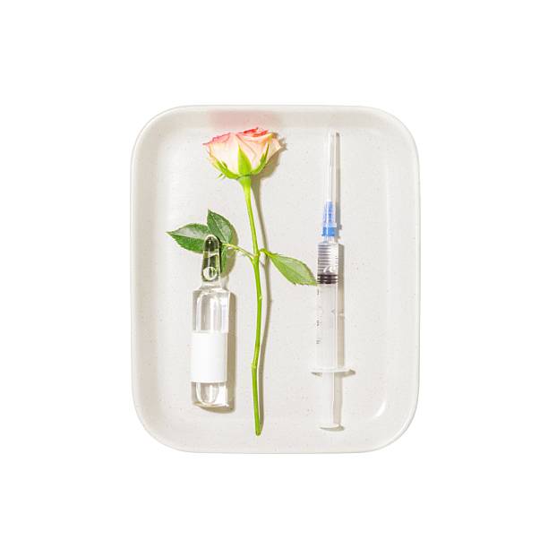 istock Syringe, Ampoule, And Rose On Tray on Transparent Background 2250003638
